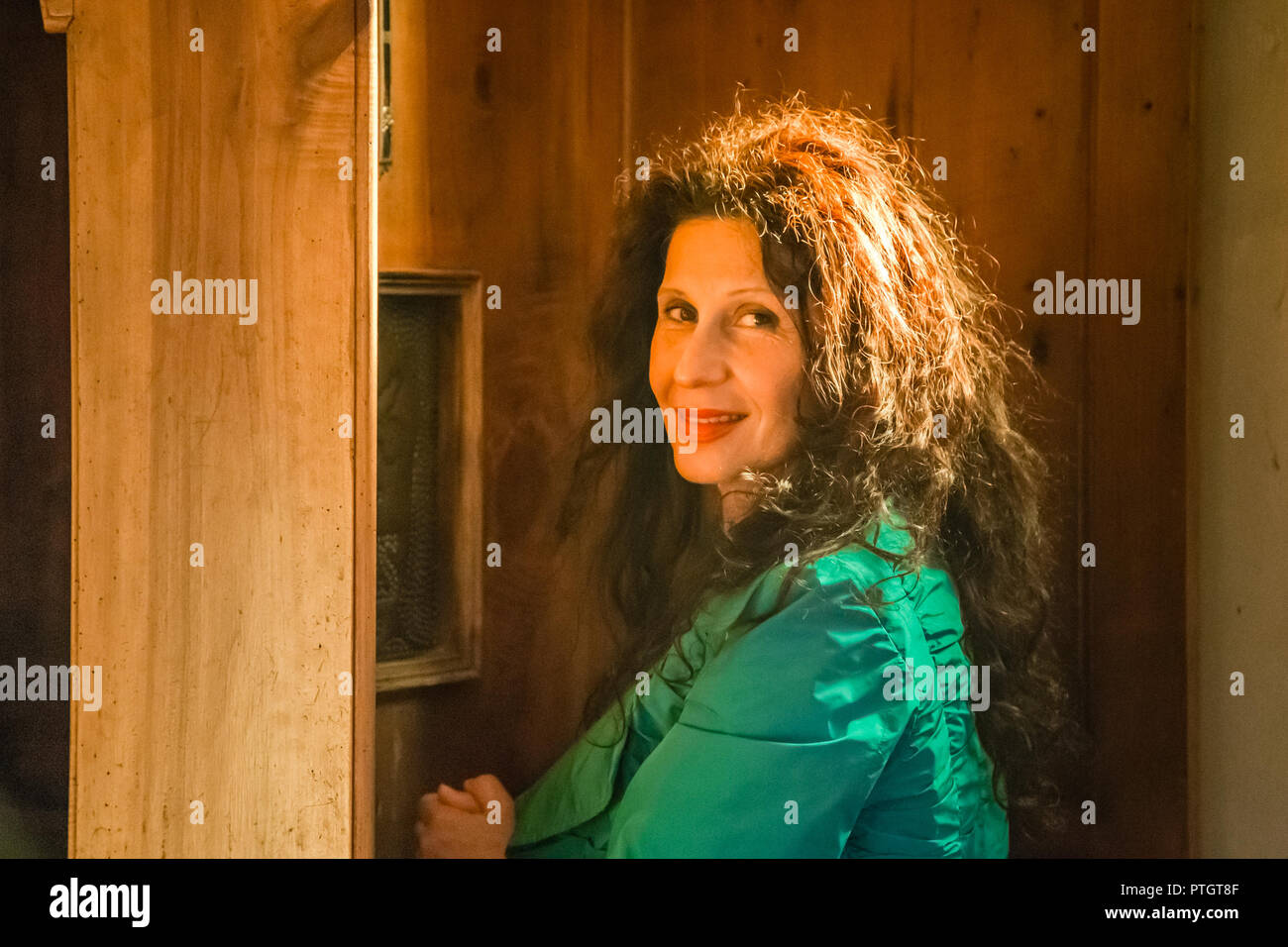 Elderly woman kneeling hi-res stock photography and images - Alamy