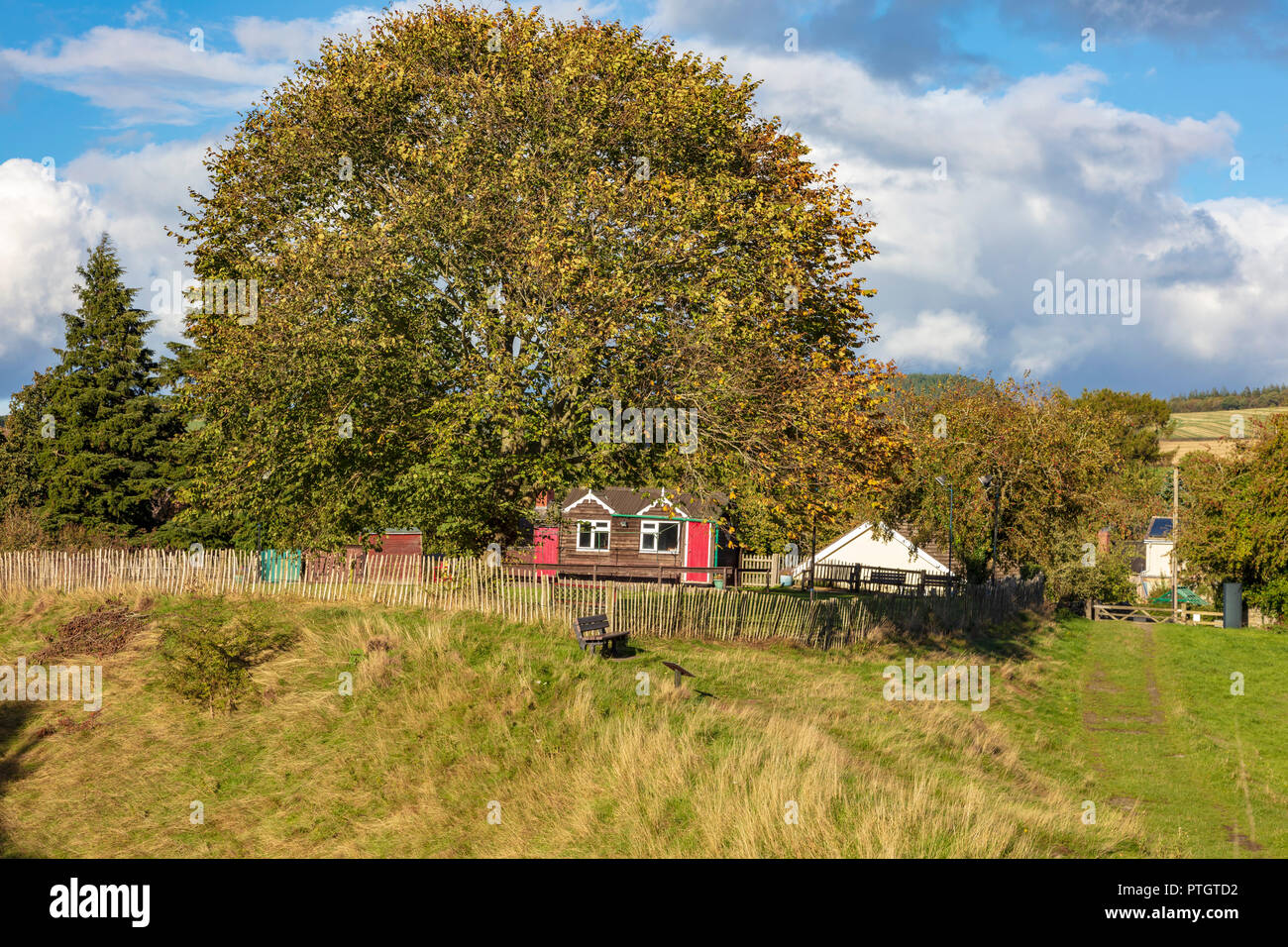 Clun village Bowling Club with wooden club house, on the outskirts of the pretty village, Clun, Shropshire, UK Stock Photo