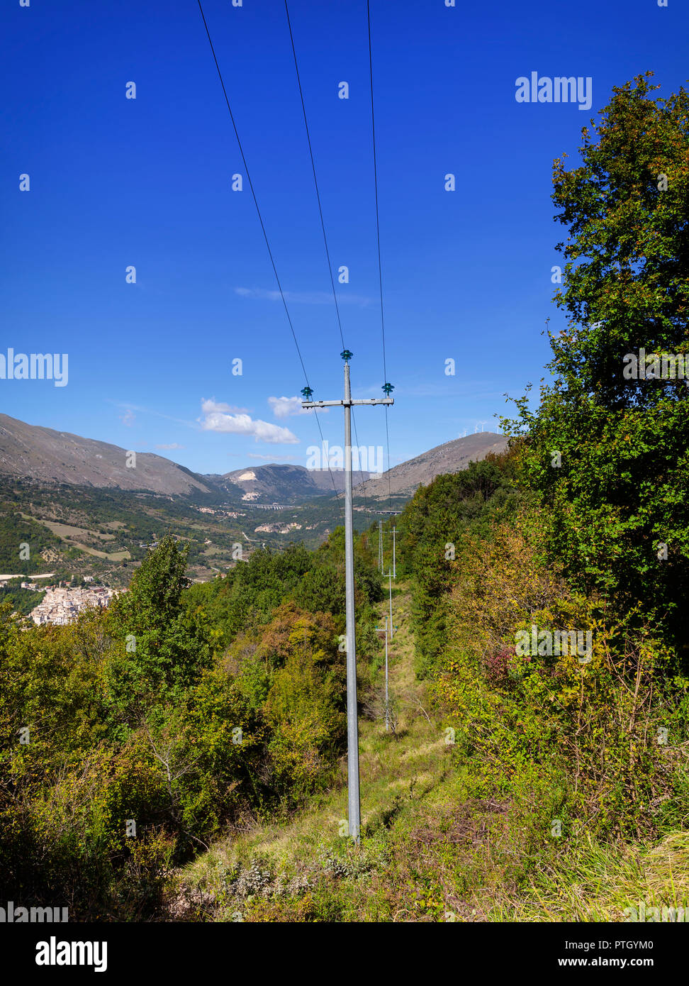 High tension electrical supply pylons in the Natural Reserve of the Gorges of the Sagittario (Riserva delle Gole del Sagittario) near Castrovalva,  a  Stock Photo