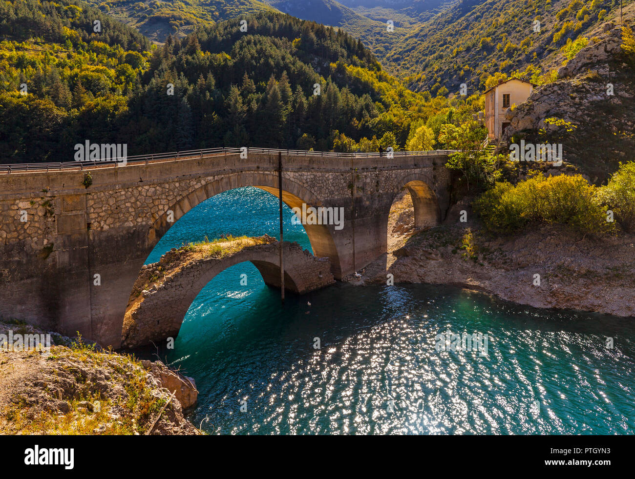 The bridge across San Domenico Lake, Prato Cardoso, Valley of the Lakes in the province of L'Aquila in the Abruzzo region of southern Italy. Stock Photo