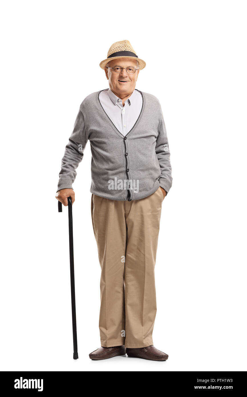 Full length portrait of a senior man standing with a cane isolated on