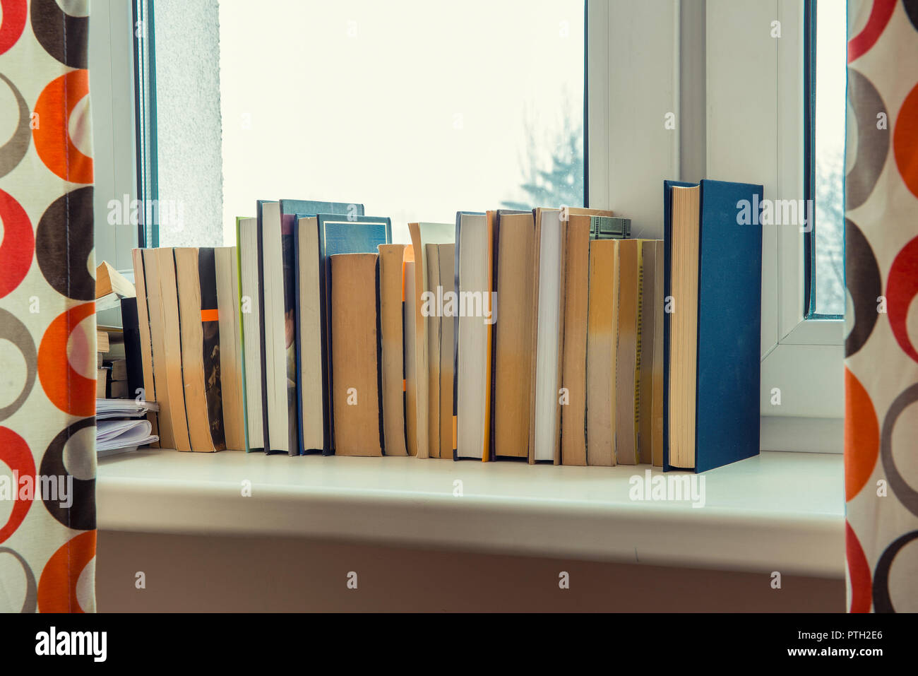 books on the windows Stock Photo