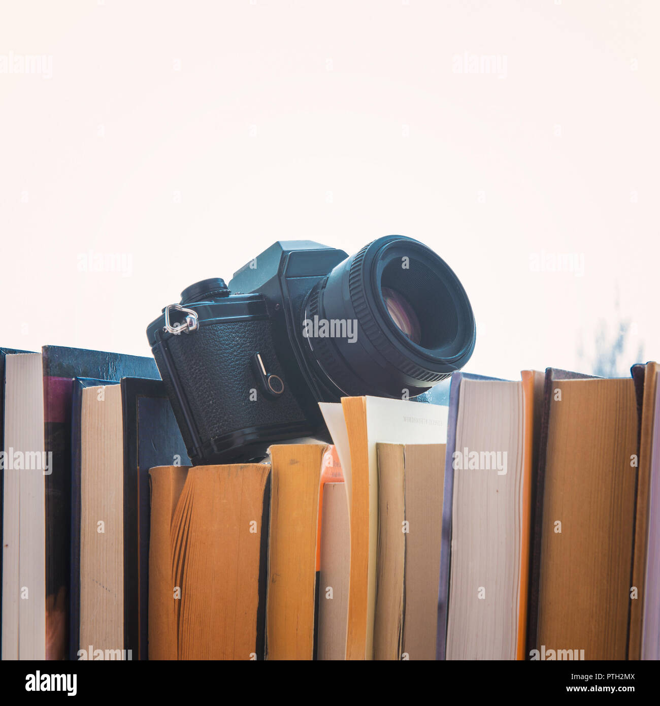 books and camera  Stock Photo