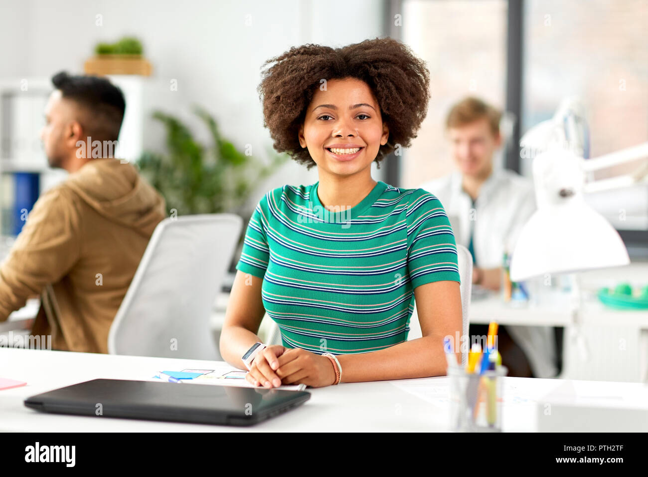 happy smiling african american woman at office Stock Photo - Alamy