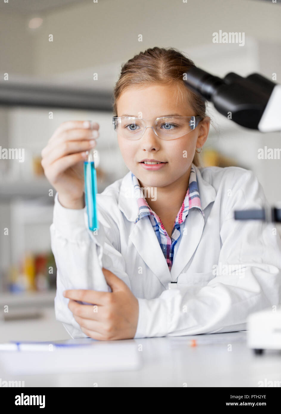 girl with test tube studying chemistry at school Stock Photo Alamy