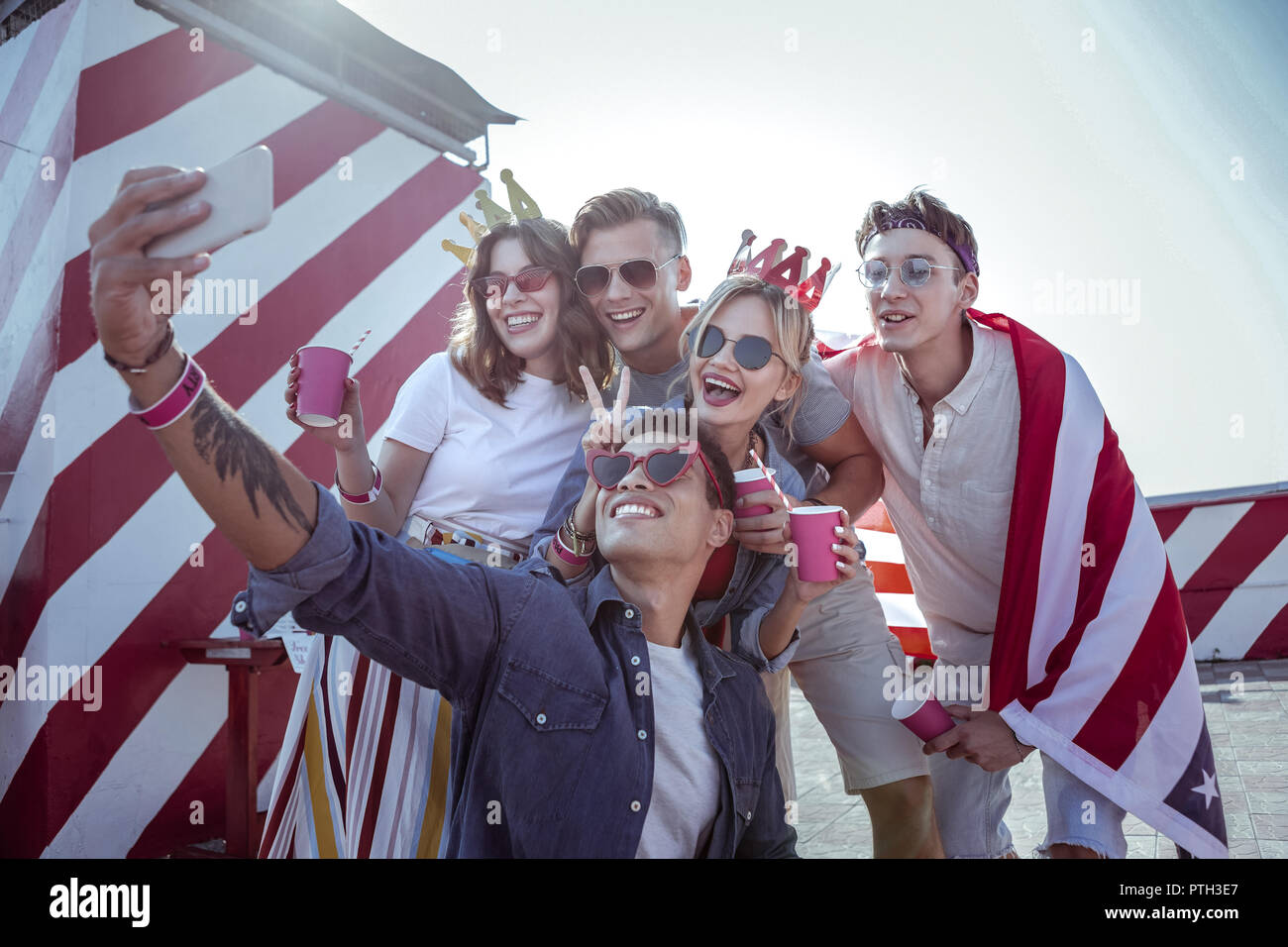 Joyful young people posing on selfie camera Stock Photo