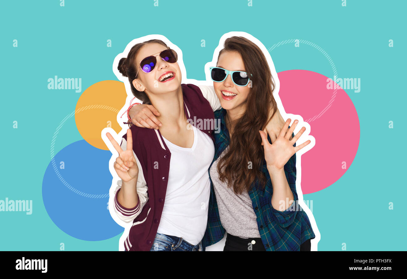 two smiling teenage girls in sunglasses Stock Photo - Alamy