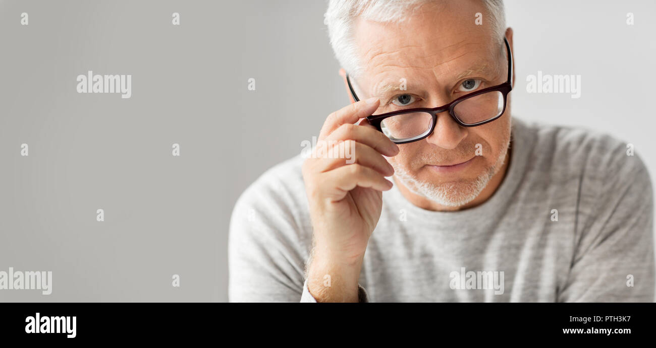 Portrait serious man in glasses hi-res stock photography and images - Alamy