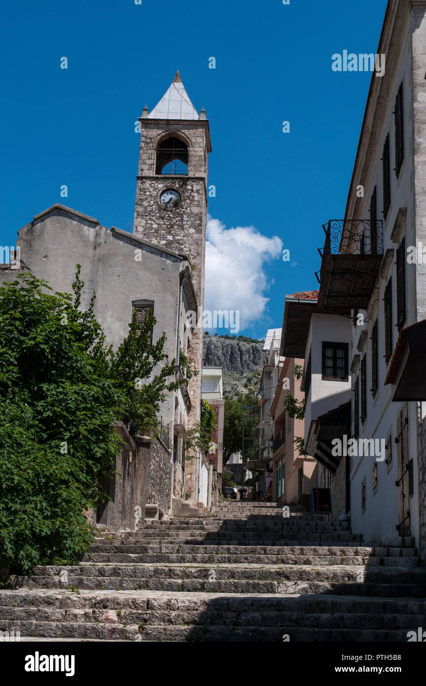 Mostar: the Clock Tower (Sahat Kula), important example of the proliﬁc Ottoman period, dated 1630, bombed and damaged in the Bosnian War (1992-1995) Stock Photo