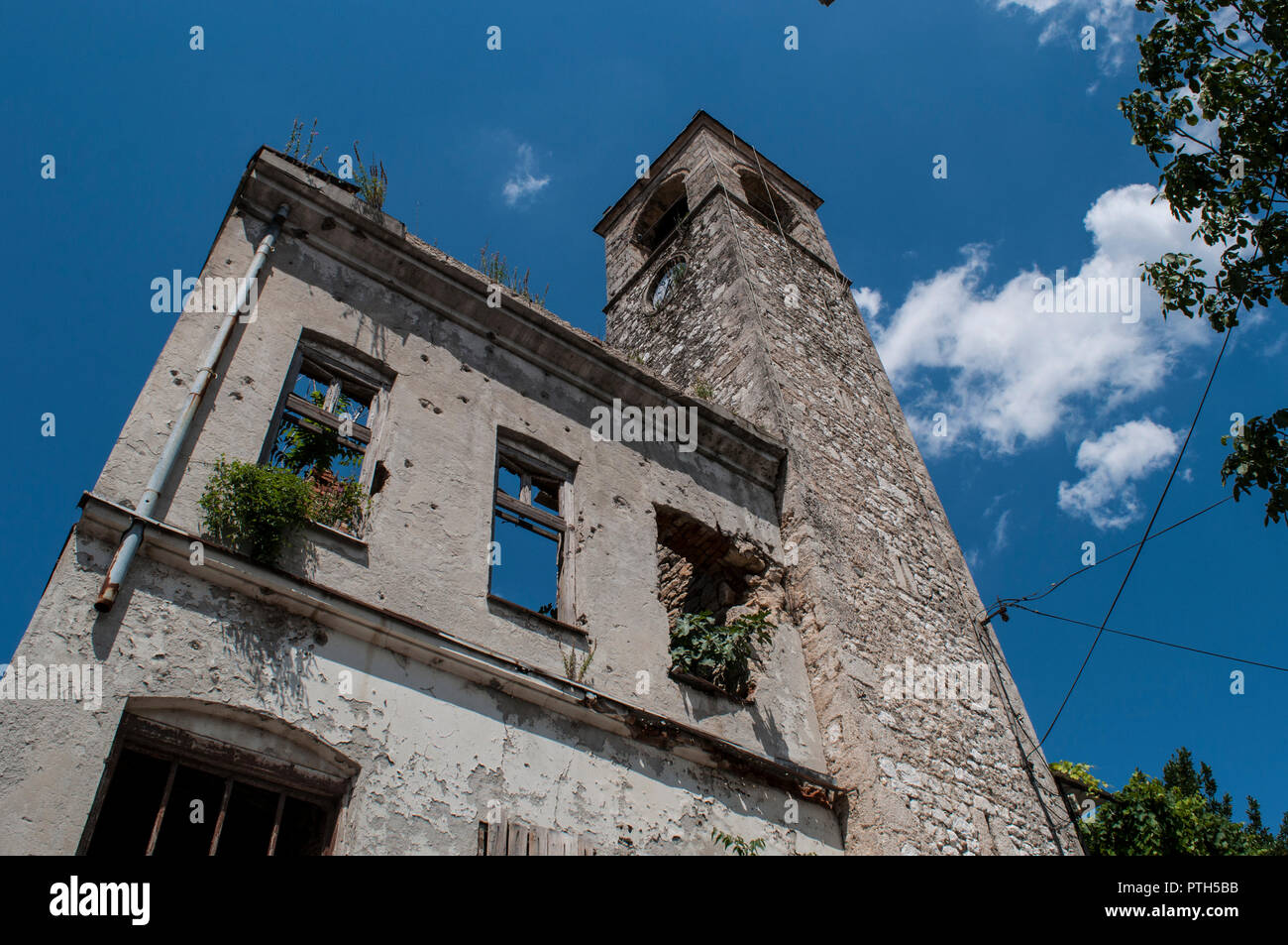 Mostar: the Clock Tower (Sahat Kula), important example of the proliﬁc Ottoman period, dated 1630, bombed and damaged in the Bosnian War (1992-1995) Stock Photo