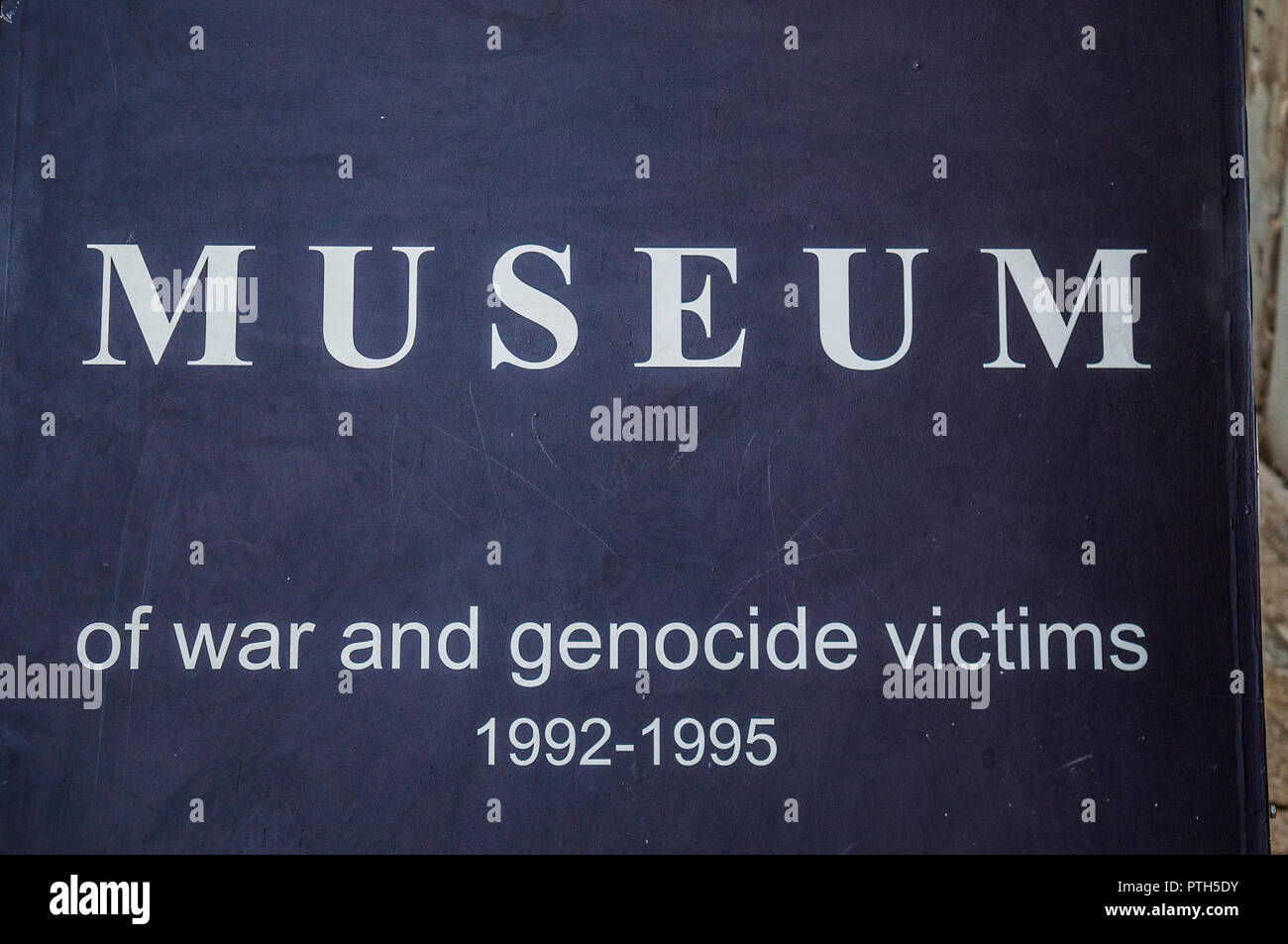 Mostar: the sign of the Museum of War and Genocide Victims 1992-1995, testimony of the Bosnian War showing personal items exhumed from mass graves Stock Photo