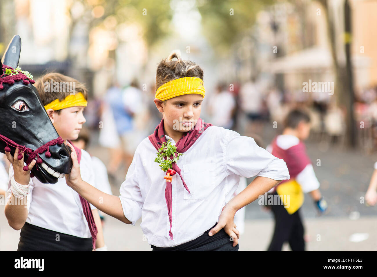Children wearing traditional costumes performing for the Feta Major in  Vilanova i la Geltru, Barcelona - Spain Stock Photo - Alamy