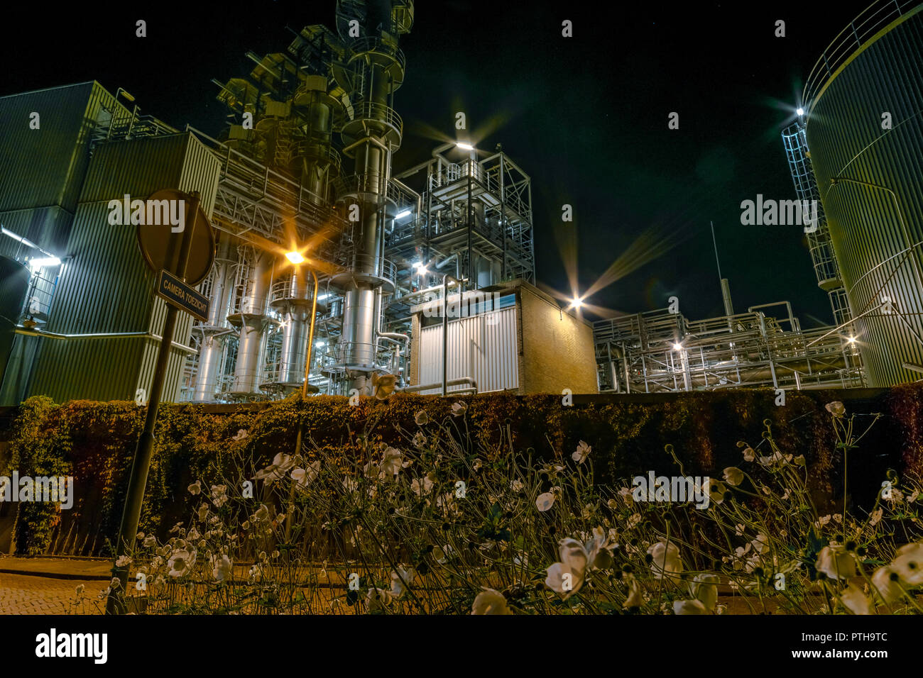 Industry at Night. Chemical plant of Unilever in Gouda, Netherlands by night. Photograph taken with a wide angle lens. Stock Photo