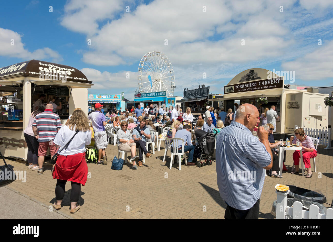People eating and drinking at food stands at the Great Yorkshire Show in summer Harrogate North Yorkshire England UK United Kingdom GB Great Britain Stock Photo