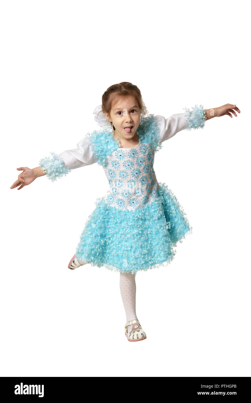 Portrait of little girl in a blue dress on white background Stock Photo ...