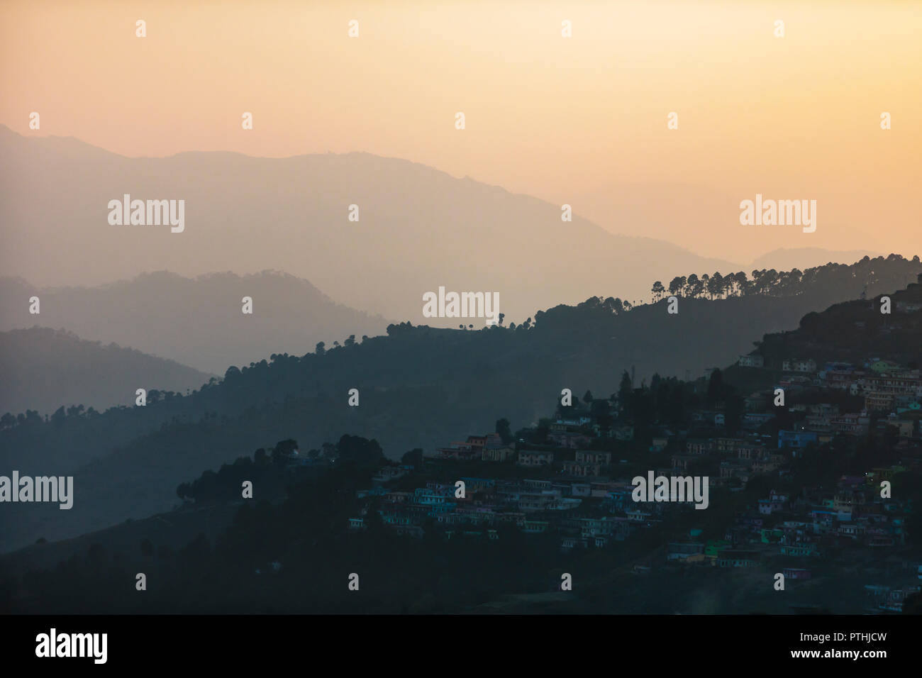 Scenic view idyllic silhouetted foothills at sunset, Supi Bageshwar, Uttarakhand, Indian Himalayan Foothills Stock Photo