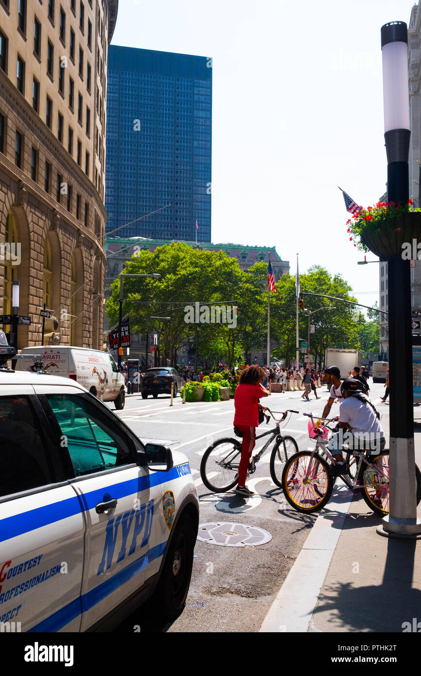 An NYPD police patrol car parked on a very sunny day on the streets of New York Stock Photo