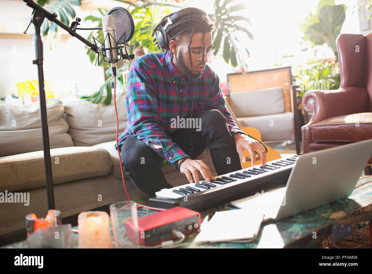 Music recording set with a microphone, keyboard, mouse and laptop. Internet  musician r influencer set Stock Photo - Alamy
