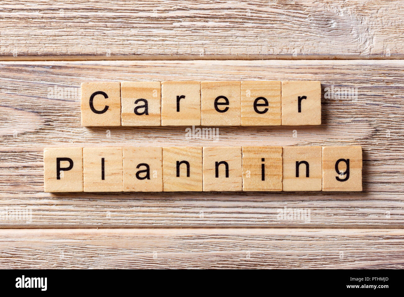 career planning word written on wood block. career planning text on