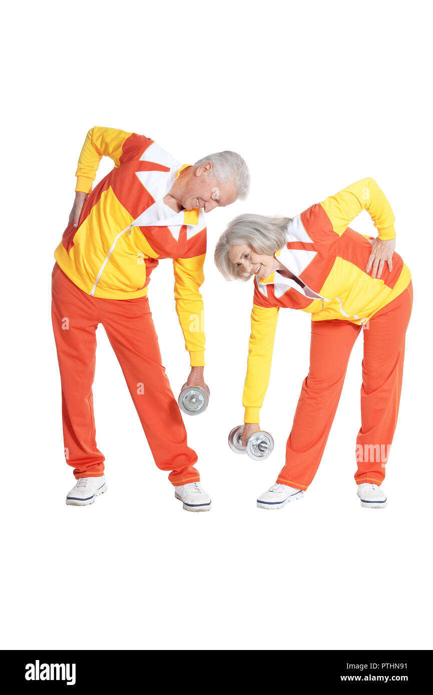Portrait of active smiling senior couple doing exercise Stock Photo - Alamy