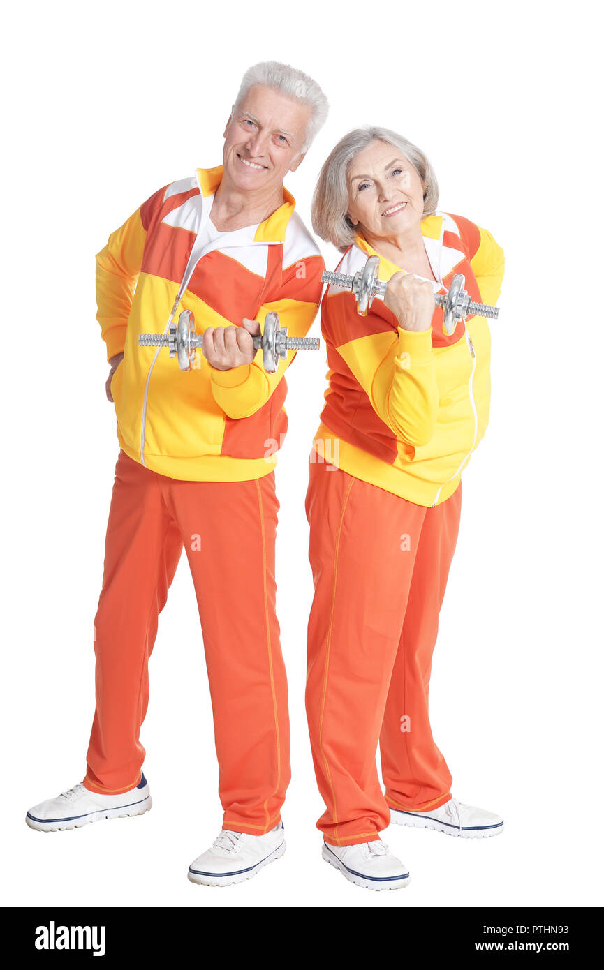 Portrait of active smiling senior couple doing exercise Stock Photo - Alamy