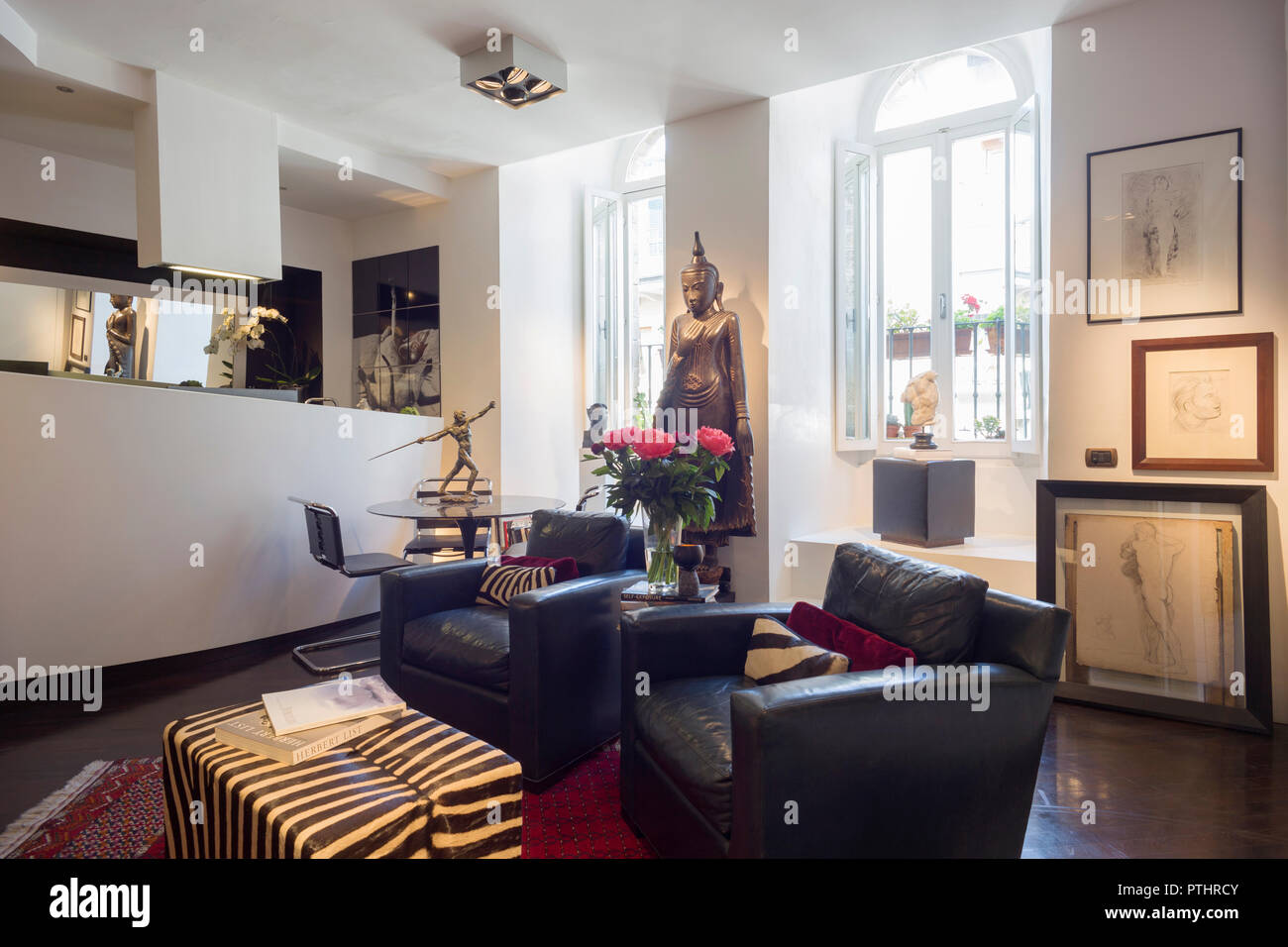 Interior of a living room with several antique and vintage furnitures