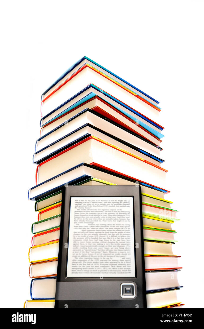 ebook reader and stack of books isolated Stock Photo Alamy