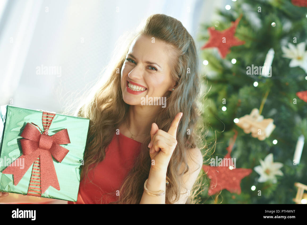 happy stylish woman in red dress with 