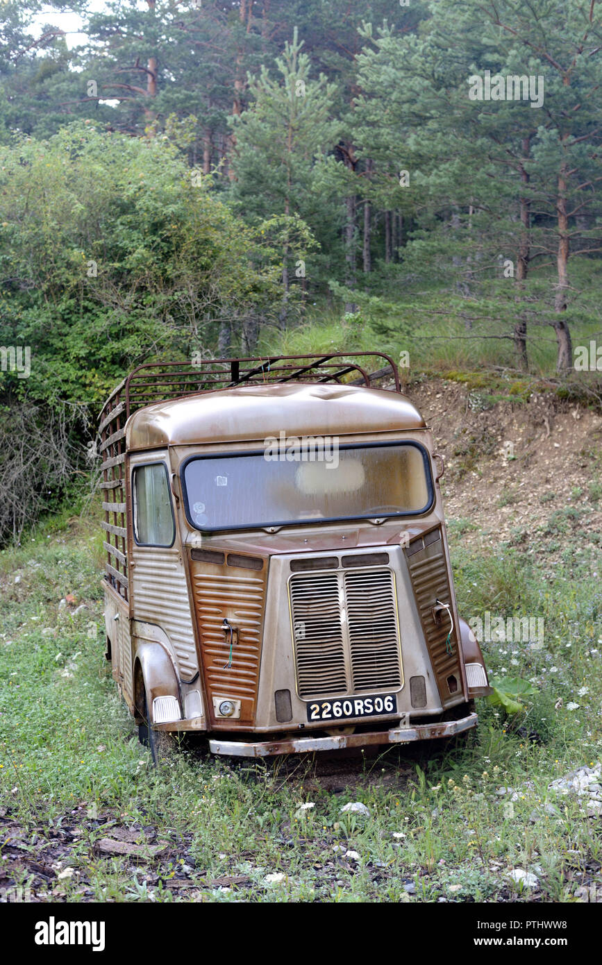 Abandoned Vintage Citroen Type H Van in Forest Clearing at Taloire Verdon Regional Park Provence France Stock Photo