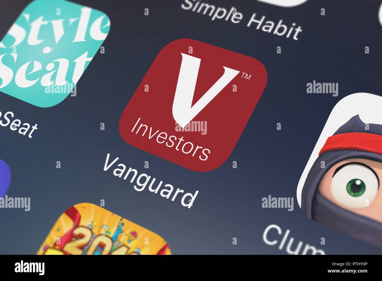 London, United Kingdom - October 09, 2018: Screenshot of the Vanguard for iPad mobile app from The Vanguard Group, Inc. icon on an iPhone. Stock Photo