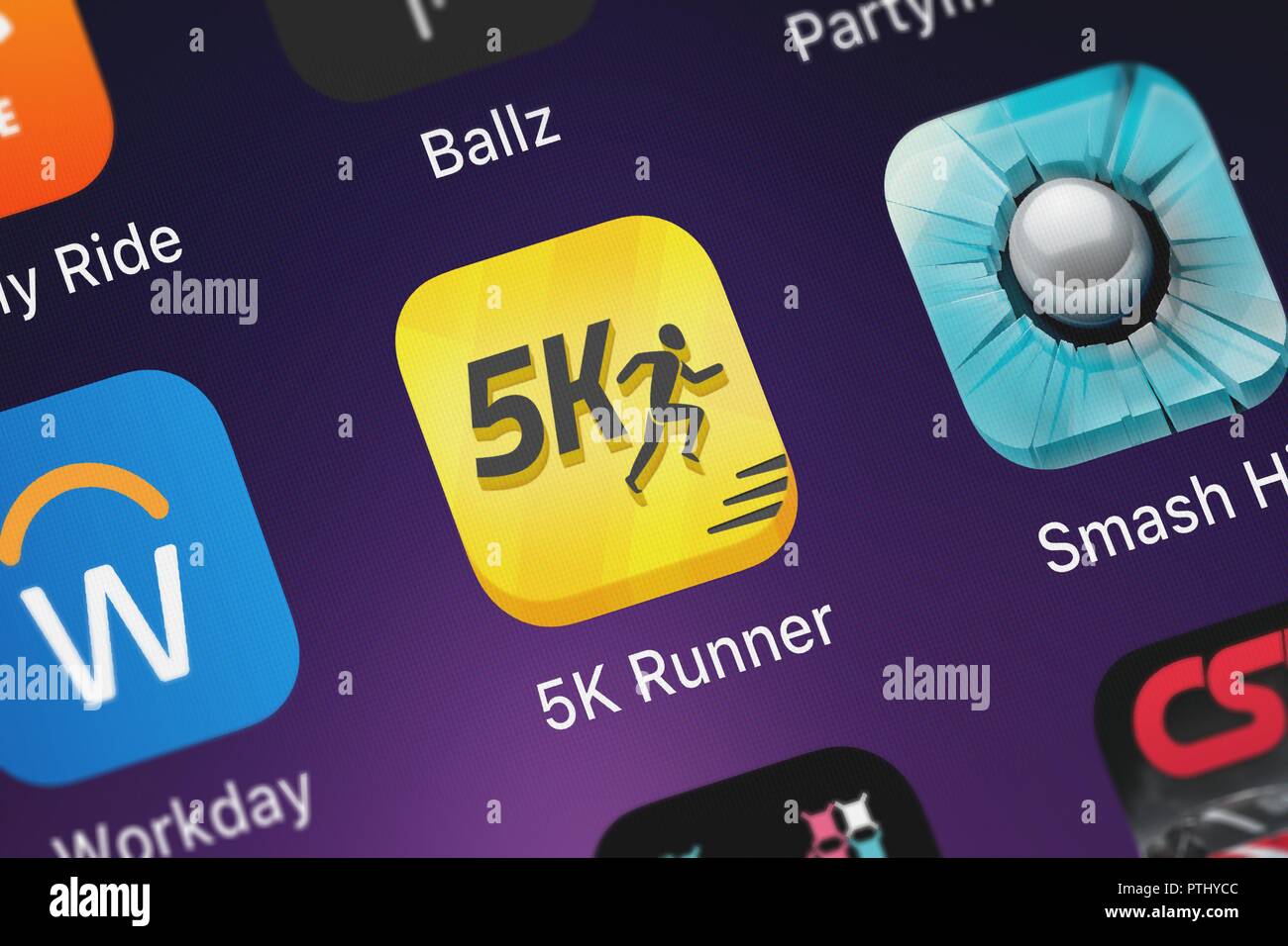 London, United Kingdom - October 09, 2018: Close-up shot of the 5K Runner: Couch Potato to 5K application icon from FITNESS22 LTD on an iPhone. Stock Photo