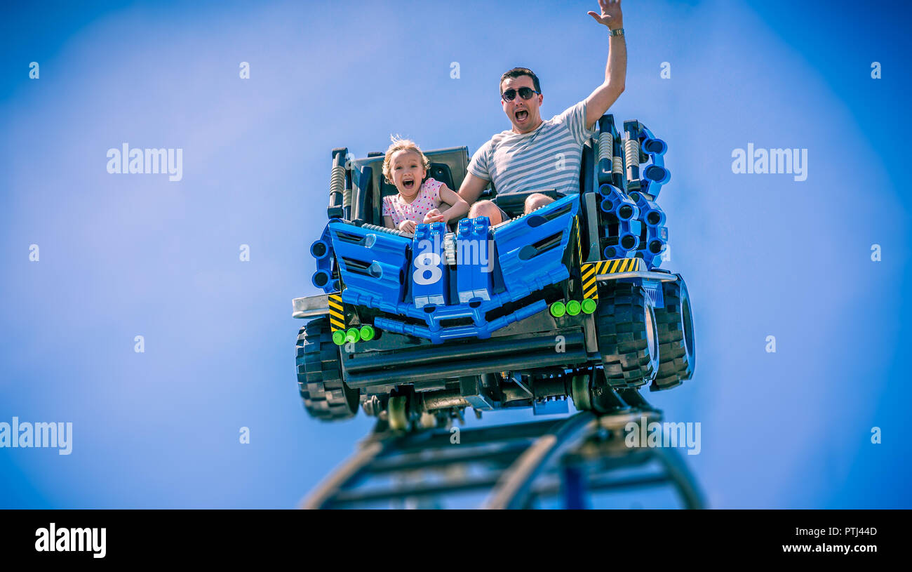 Father And Young Daughter Screaming With Arms Raised On Roller Coaster In Florida Usa Taken On 1451