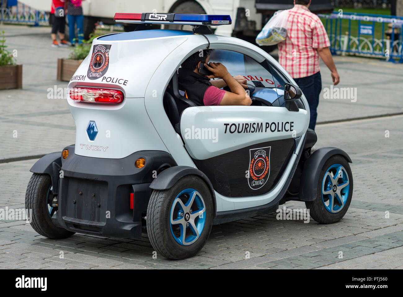An all electric two seater Renault Twizy used as a tourism police vehicle with police officer in the car, Istanbul, Turkey Stock Photo