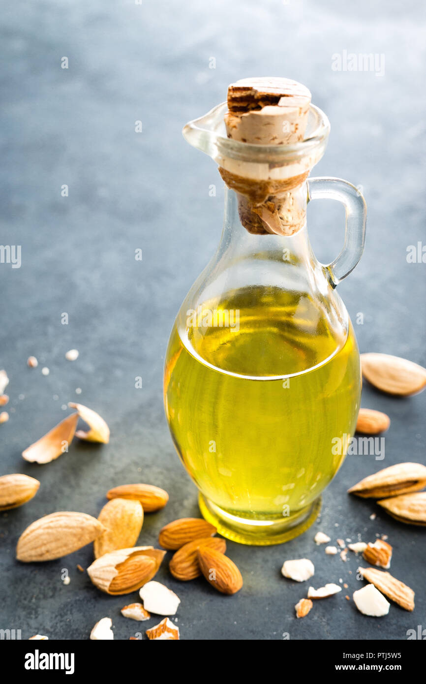 Almond oil in glass bottle and almond nuts. Almonds Stock Photo Alamy