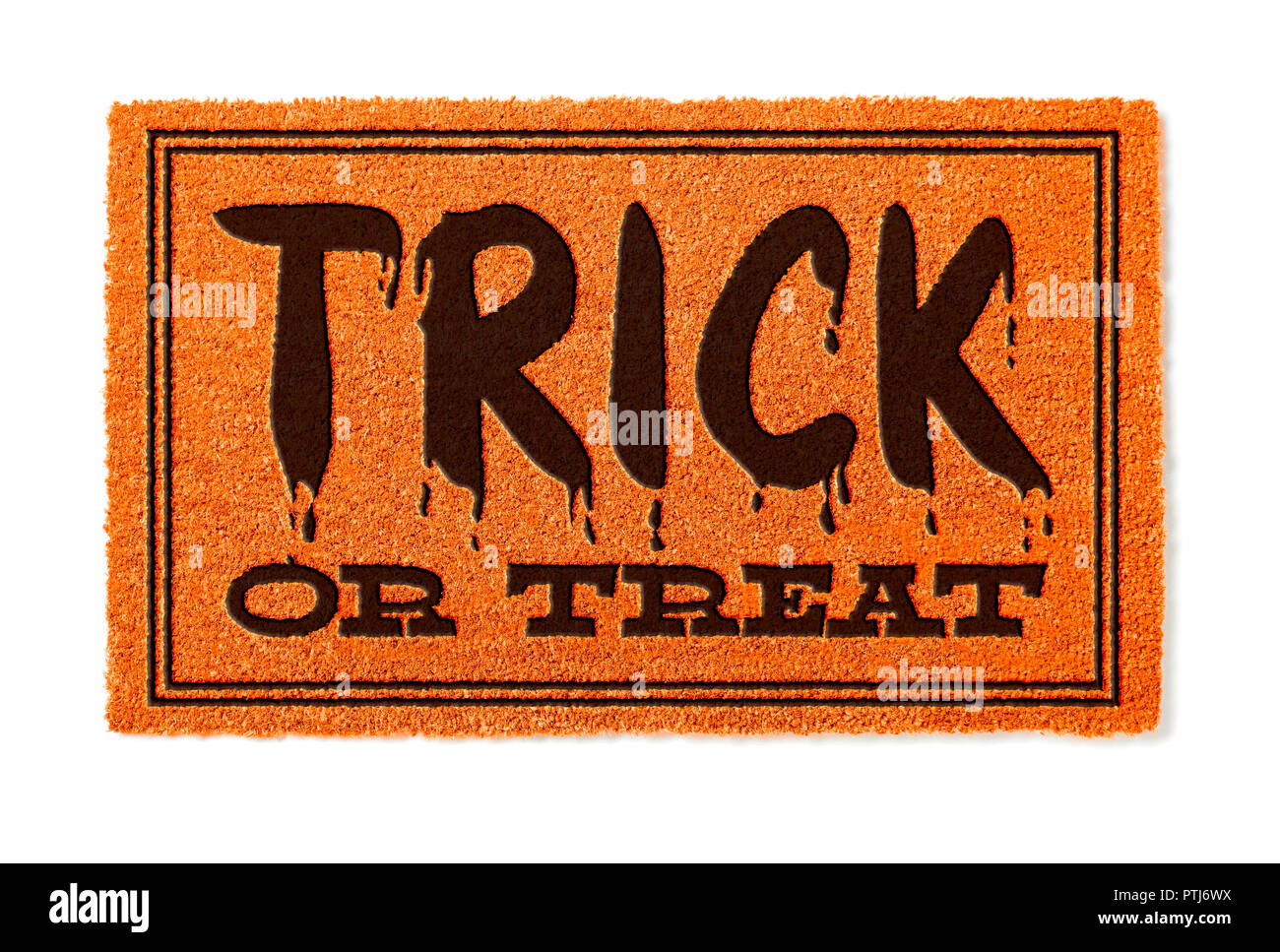 Trick Or Treat Halloween Orange Welcome Mat Isolated on White Background. Stock Photo