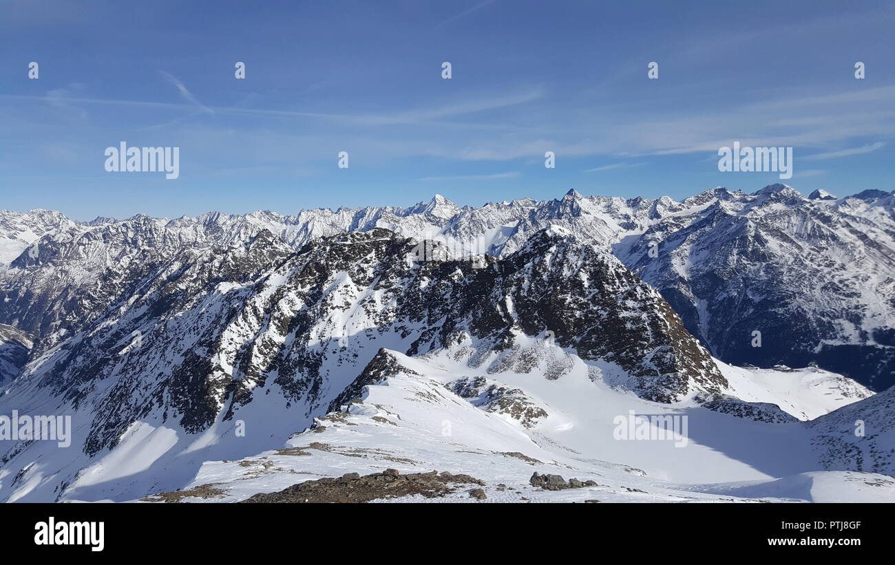 Image of snow covered mountain peaks in the austrian alps Stock Photo ...