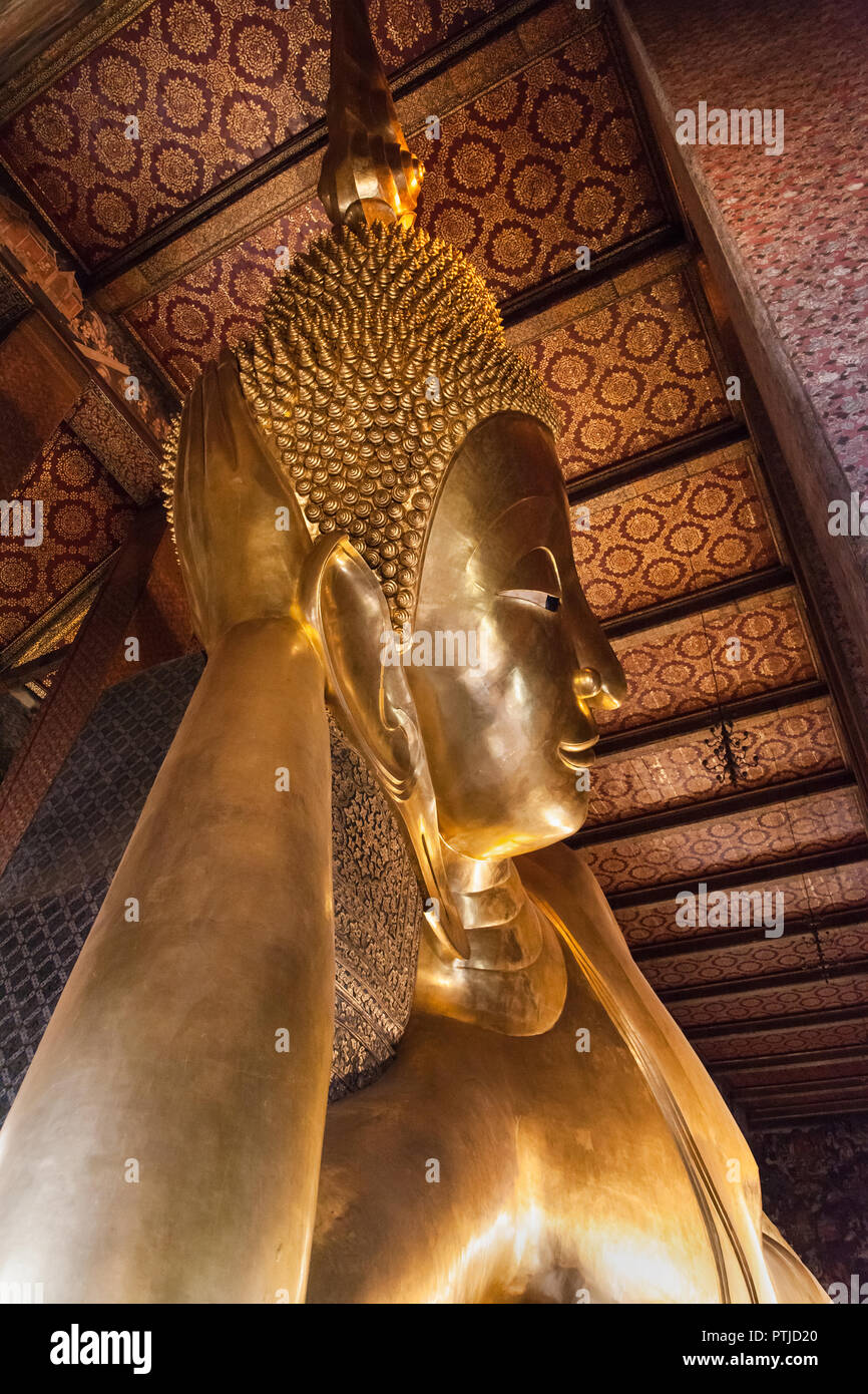 The Golden Reclining Buddha at Wat Pho in Bangkok, Thailand. Stock Photo