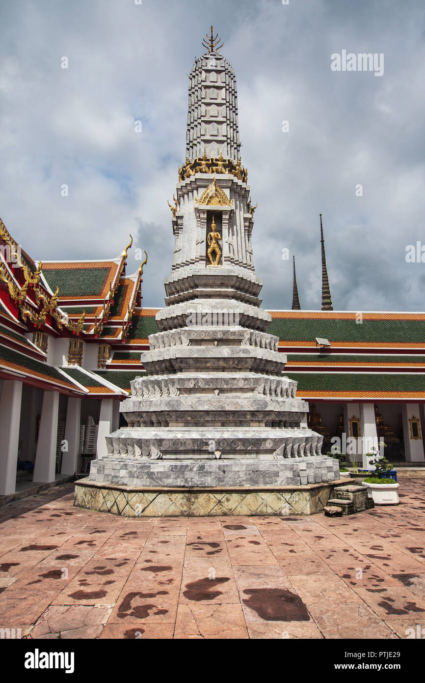 Phra Prang, a khmer-style tower in the courtyard around the ubosot of the Wat Pho, Bangkok, Thailand. Stock Photo