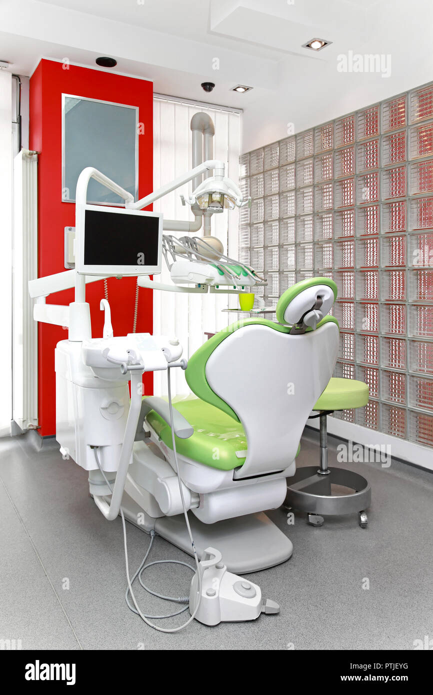 New dental chair in modern dentist office Stock Photo