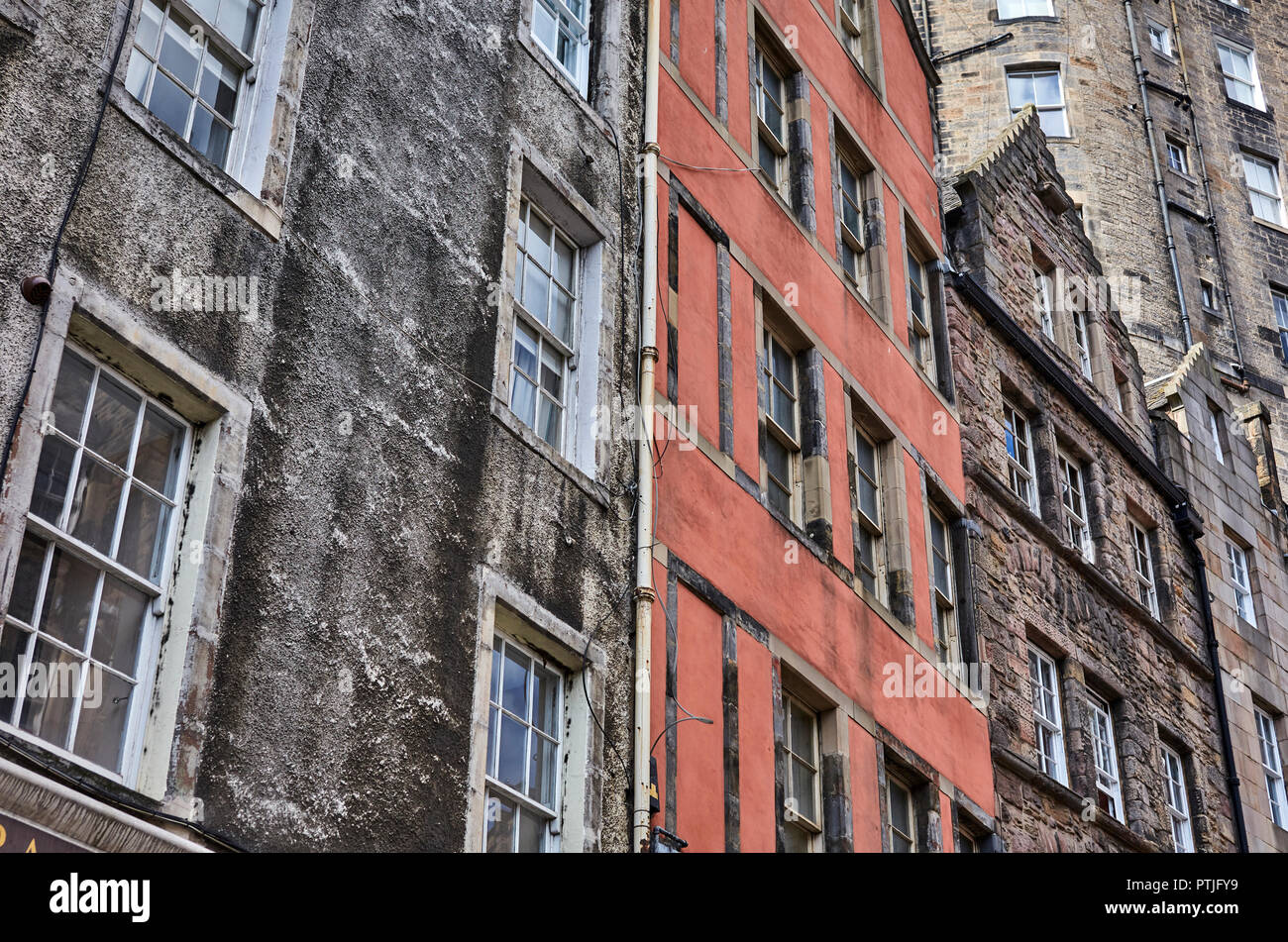 Looking up towards many old buildings in Edinburgh. Stock Photo