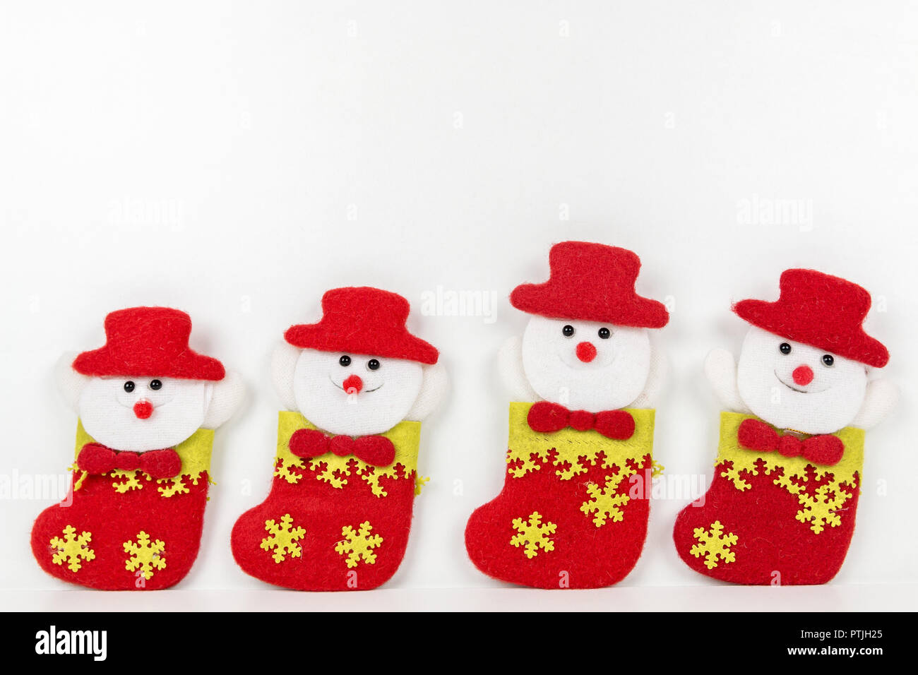 Christmas decoration with group of snowmen isolated on white background ...