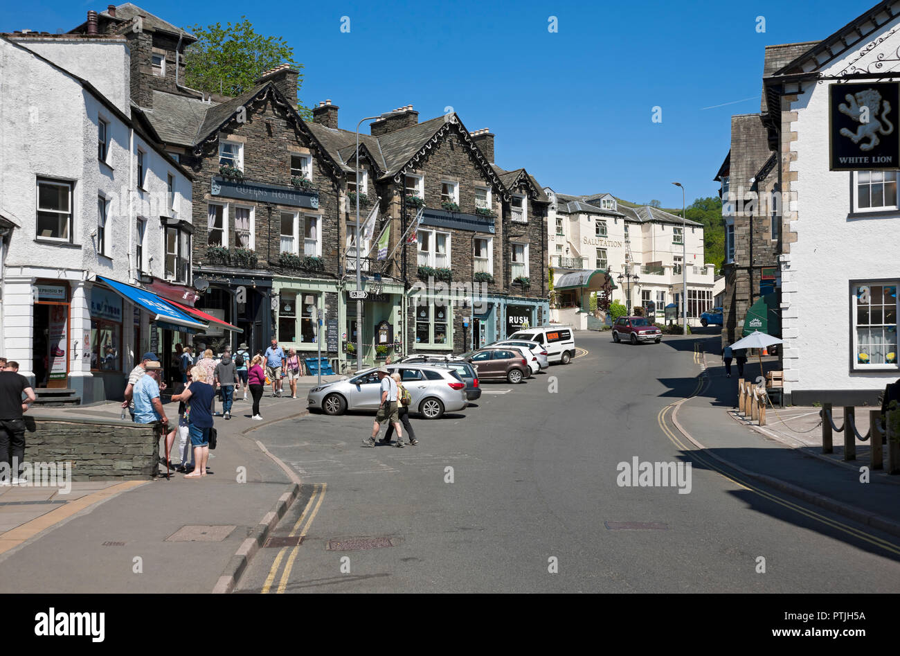 Queens Hotel and shops in Ambleside town centre. Stock Photo