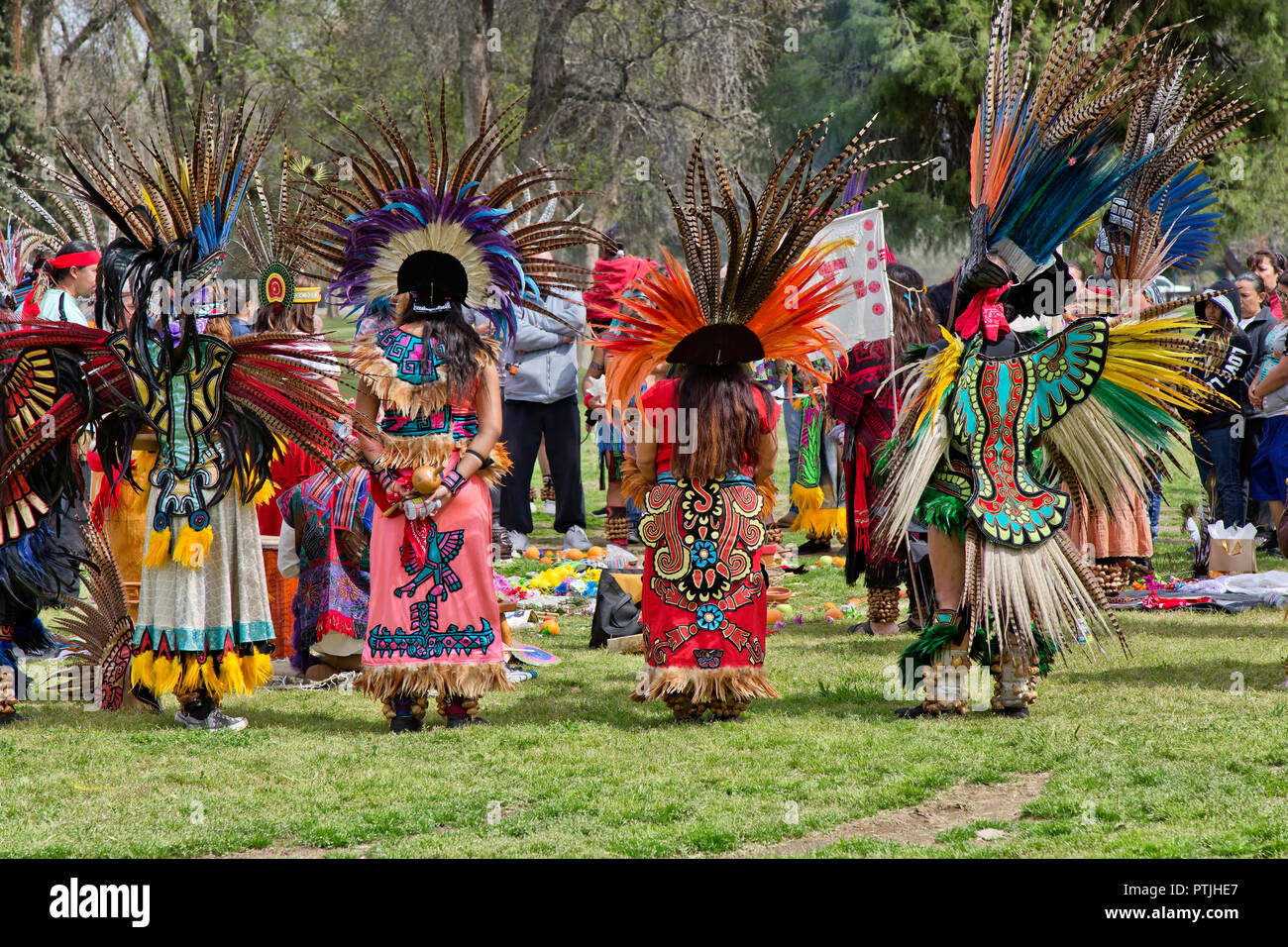 Colorful Aztec group dancers attending cermony & dance, Hart Memorial Park, Bakersfield, Kern County, California, United States. Stock Photo