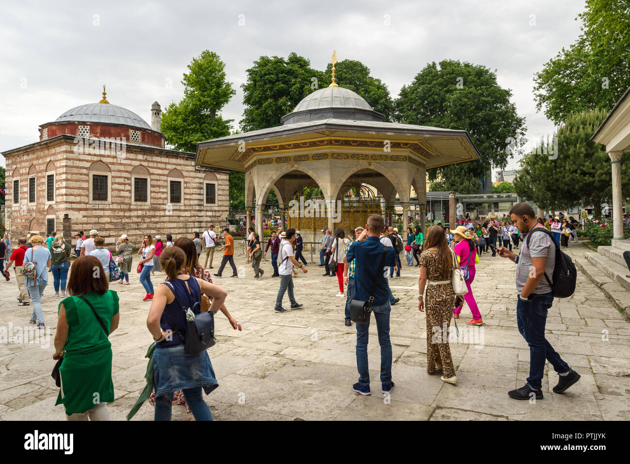 The ablution fountain outside of the Hagia Sophia museum as tourists ...