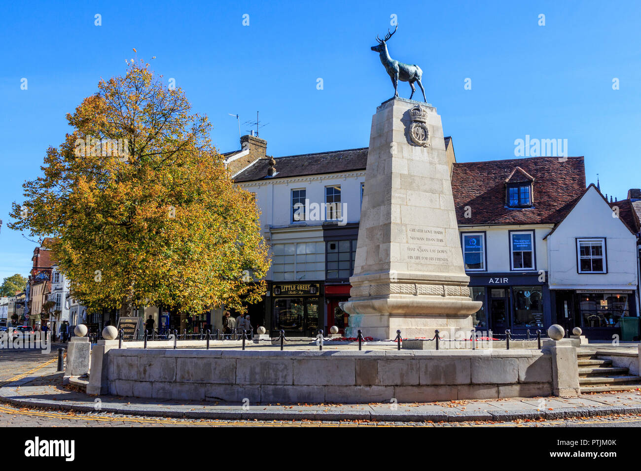 war memorial with county stag symbol aloft, Hertford town centre shopping and attractions, the county town of Hertfordshire, England Stock Photo