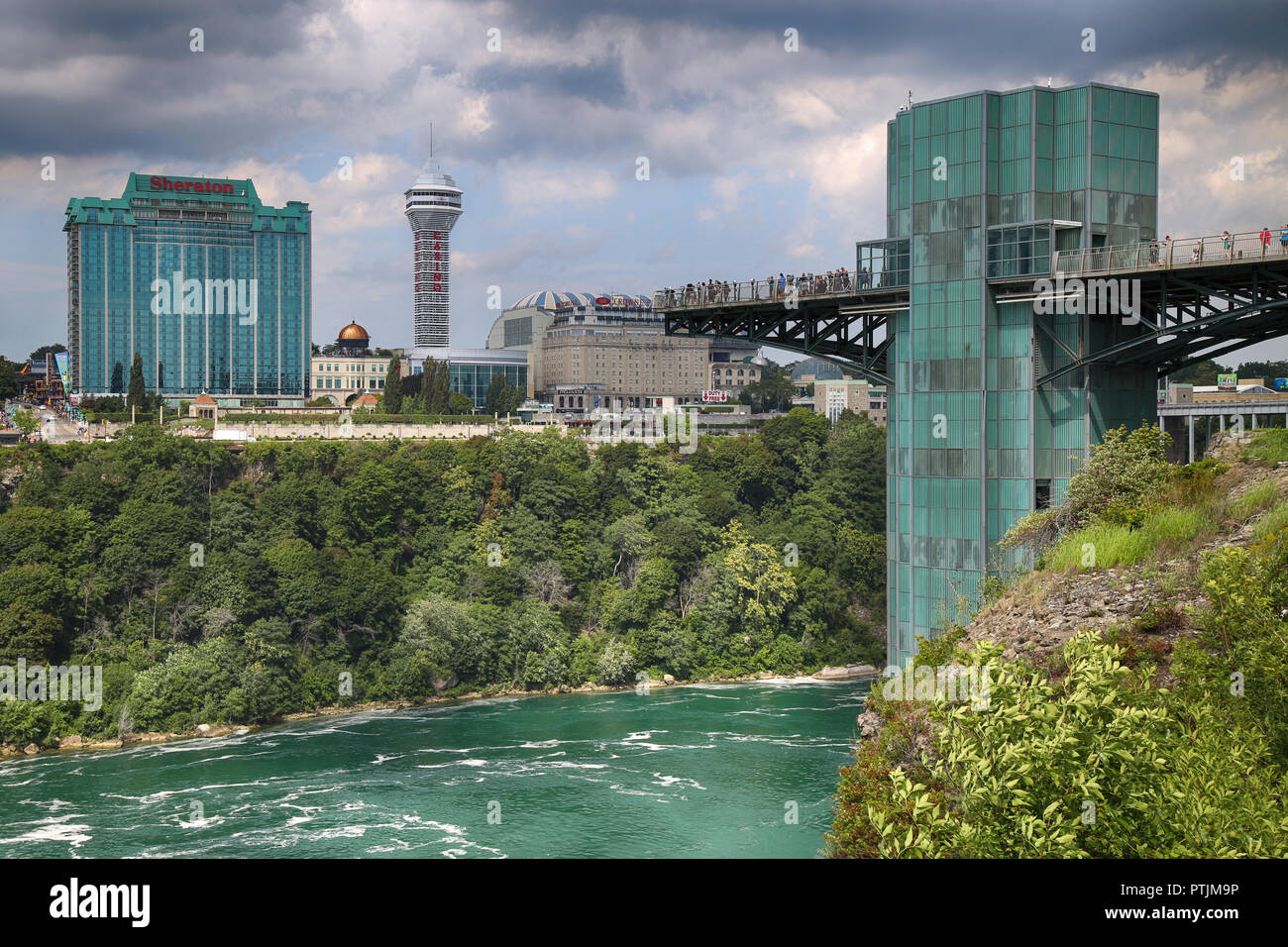 Niagara Falls, USA – August 29, 2018: Beautiful view of Rainbow Bridge from American side and the Canadian side with famous hotels across, New York St Stock Photo