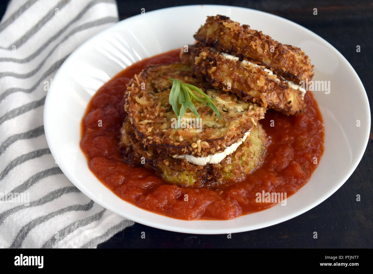 Eggplant and GoatCheese Sandwiches with Tomato Tarragon Sauce Stock