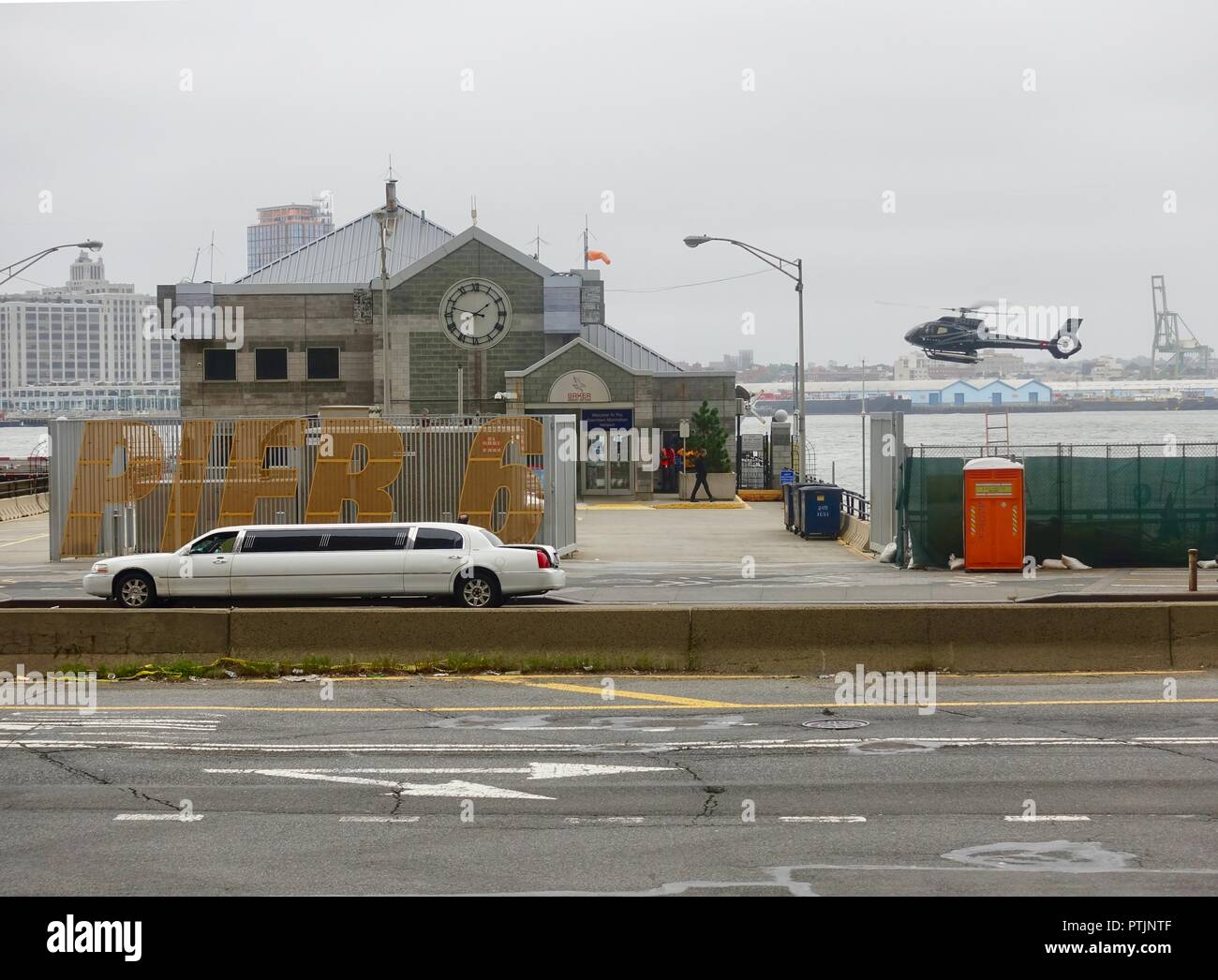 Helicopter landing at Manhattan Helicopters along the East River