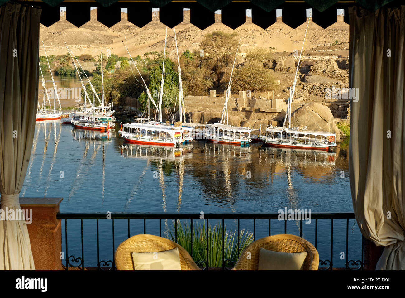 Looking out over the River Nile at Elephantine Island from the historic Old Cataract Hotel in Aswan Stock Photo