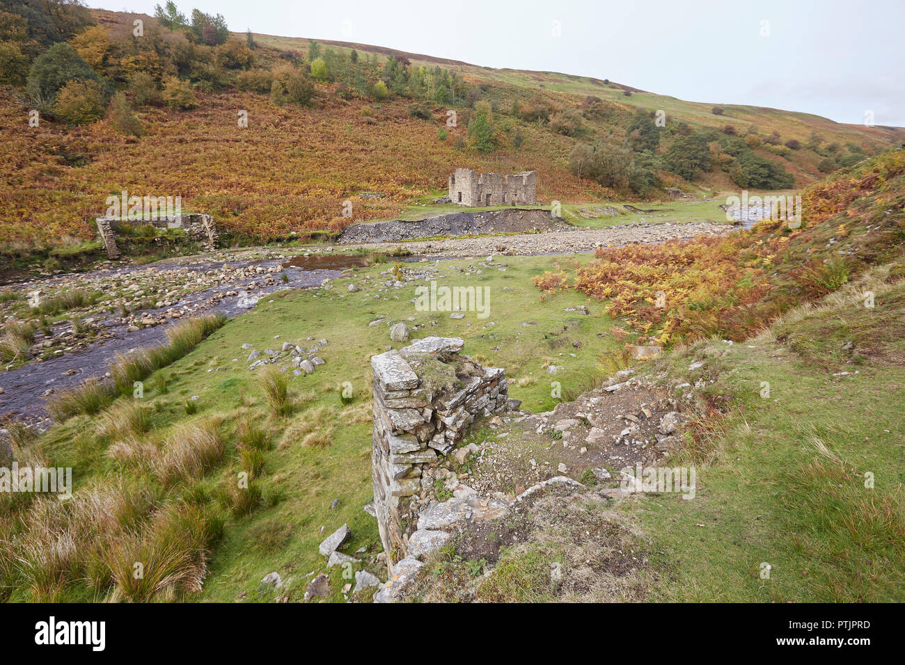 Remains of the once thriving lead mining industry, Gunnerside Ghyll Gill, Beck, Swaledale, Yorkshire Dales, UK. Sir Francis Dressing Floor. Stock Photo